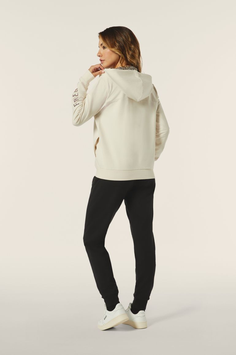 Carica immagine in Galleria Viewer, Tuta donna Freddy in felpa con zip e cappuccio foderato animalier