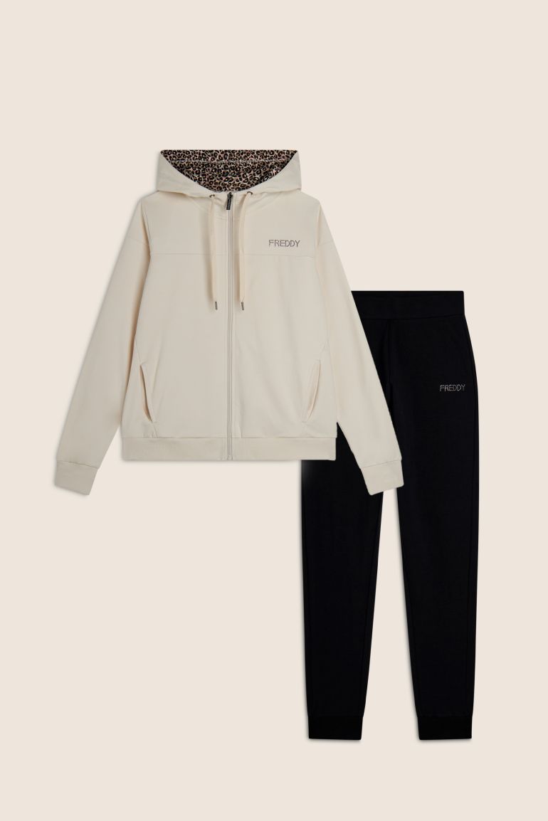 Carica immagine in Galleria Viewer, Tuta donna Freddy in felpa con zip e cappuccio foderato animalier