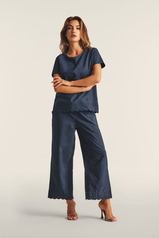 Pantaloni wide leg in cotone navetta con ricami Sangallo