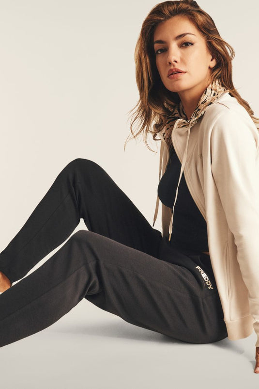 Tuta interlock con zip e collo alto interno fantasia