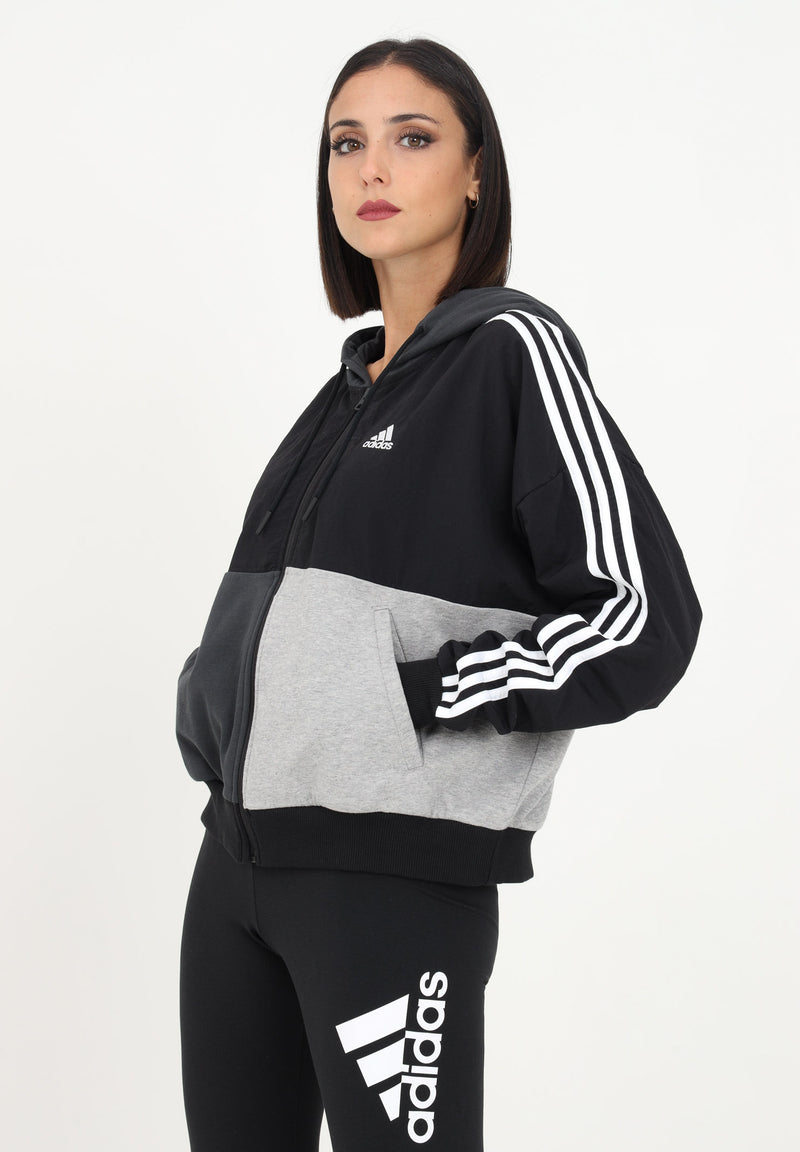 Carica immagine in Galleria Viewer, Felpa Adidas con zip nera da donna con ricamo logo e tre strisce iconiche
