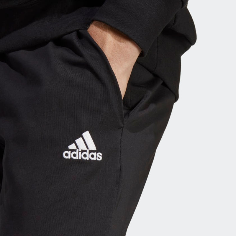 Carica immagine in Galleria Viewer, Pantaloni adidas Essentials Single Jersey Tapered Open uomo