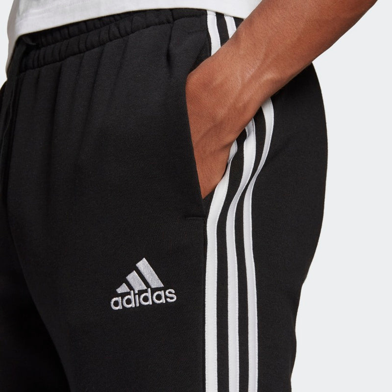 Carica immagine in Galleria Viewer, PANTALONI ESSENTIALS FLEECE TAPERED CUFF 3-STRIPES Black / White