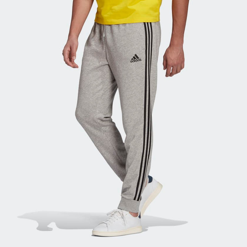 Carica immagine in Galleria Viewer, PANTALONI ESSENTIALS FRENCH TERRY TAPERED CUFF 3-STRIPES