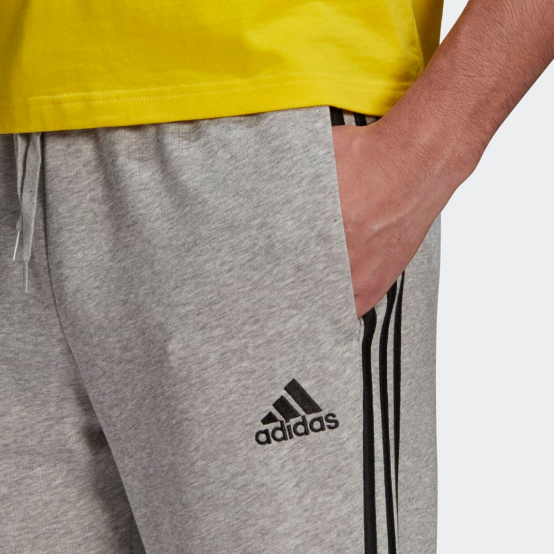 Carica immagine in Galleria Viewer, PANTALONI ESSENTIALS FRENCH TERRY TAPERED CUFF 3-STRIPES