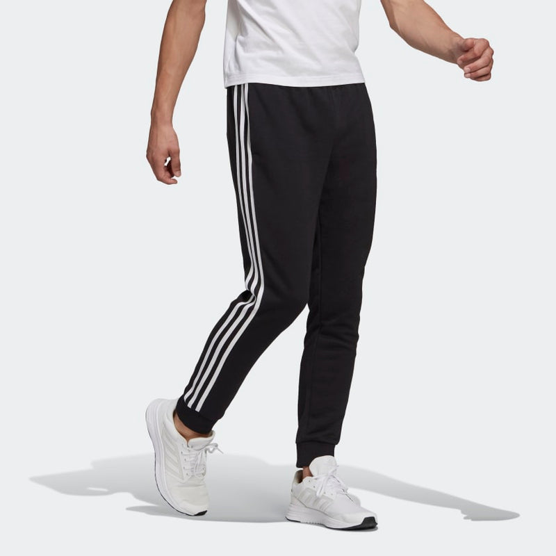 Carica immagine in Galleria Viewer, PANTALONI ADIDAS ESSENTIALS FRENCH TERRY TAPERED CUFF 3-STRIPES