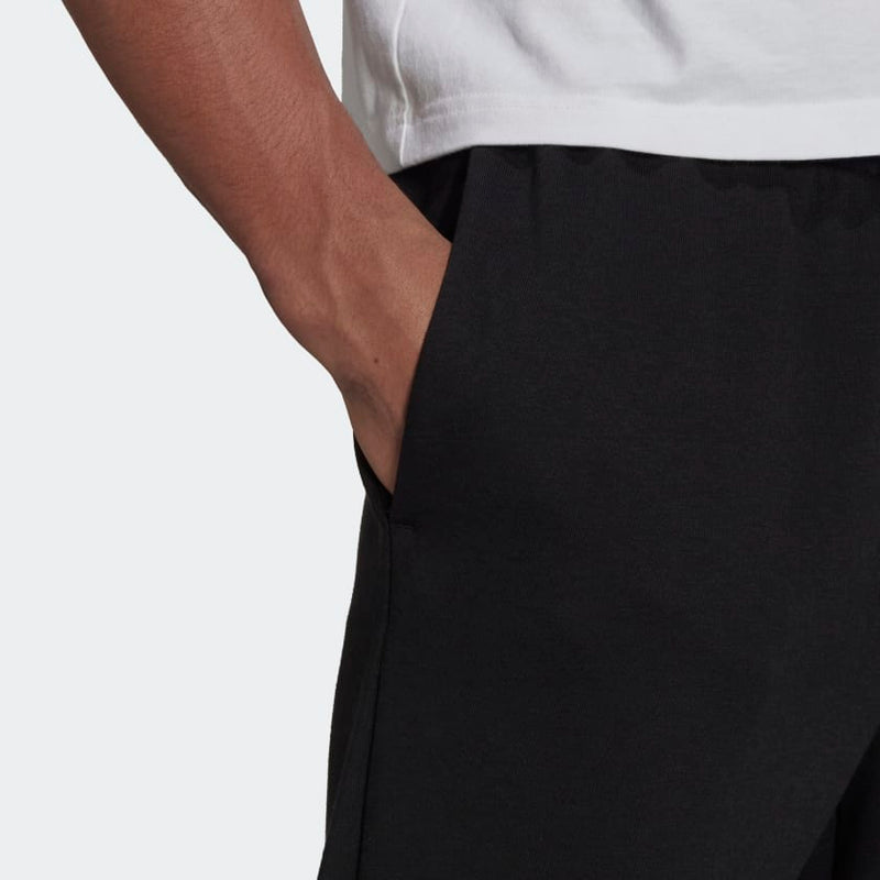 Carica immagine in Galleria Viewer, PANTALONI ESSENTIALS FRENCH TERRY TAPERED ELASTIC CUFF LOGO