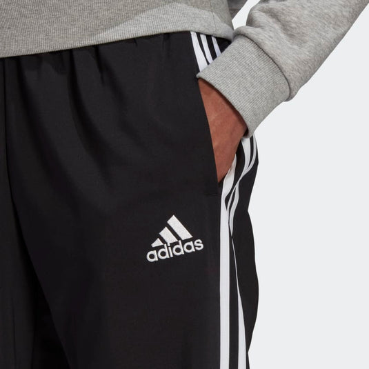 PANTALONI AEROREADY ESSENTIALS TAPERED CUFF WOVEN 3-STRIPES