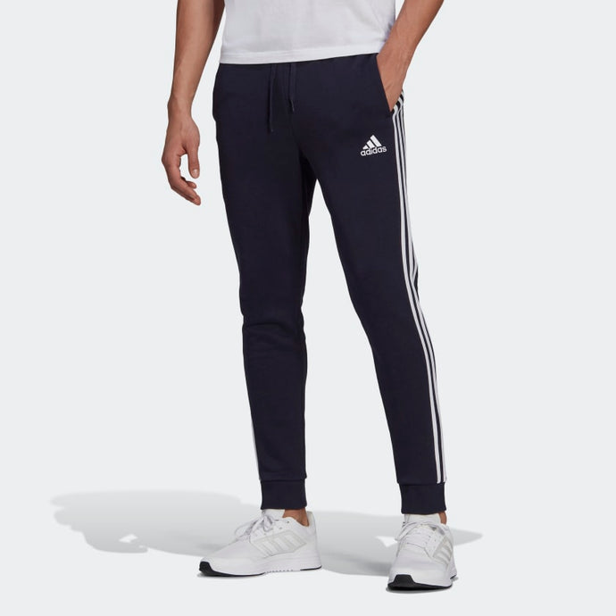 PANTALONI ESSENTIALS FLEECE TAPERED CUFF 3-STRIPES