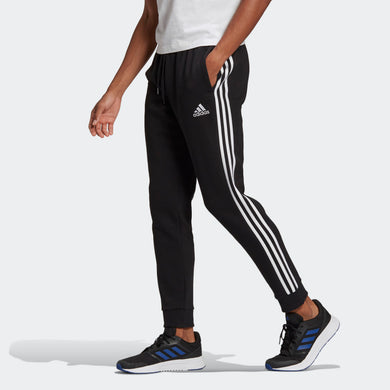 PANTALONI ESSENTIALS FLEECE TAPERED CUFF 3-STRIPES Black / White