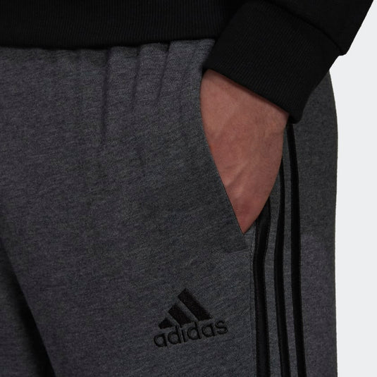 PANTALONI ESSENTIALS FRENCH TERRY TAPERED CUFF 3-STRIPES