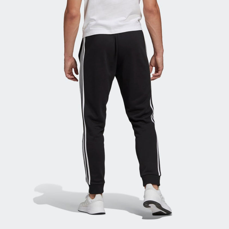 Carica immagine in Galleria Viewer, PANTALONI ADIDAS ESSENTIALS FRENCH TERRY TAPERED CUFF 3-STRIPES
