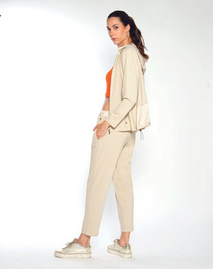 Tuta donna full zip con cappuccio crema